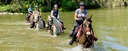 River crossing on horseback along the Fluvià near the Costa Brava in Catalonia